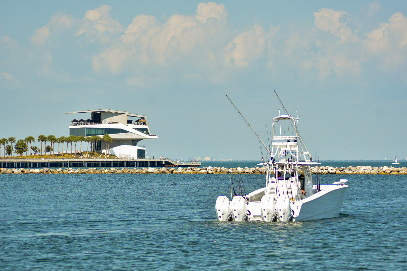 Fishing boat passing the St. Pete Pier building